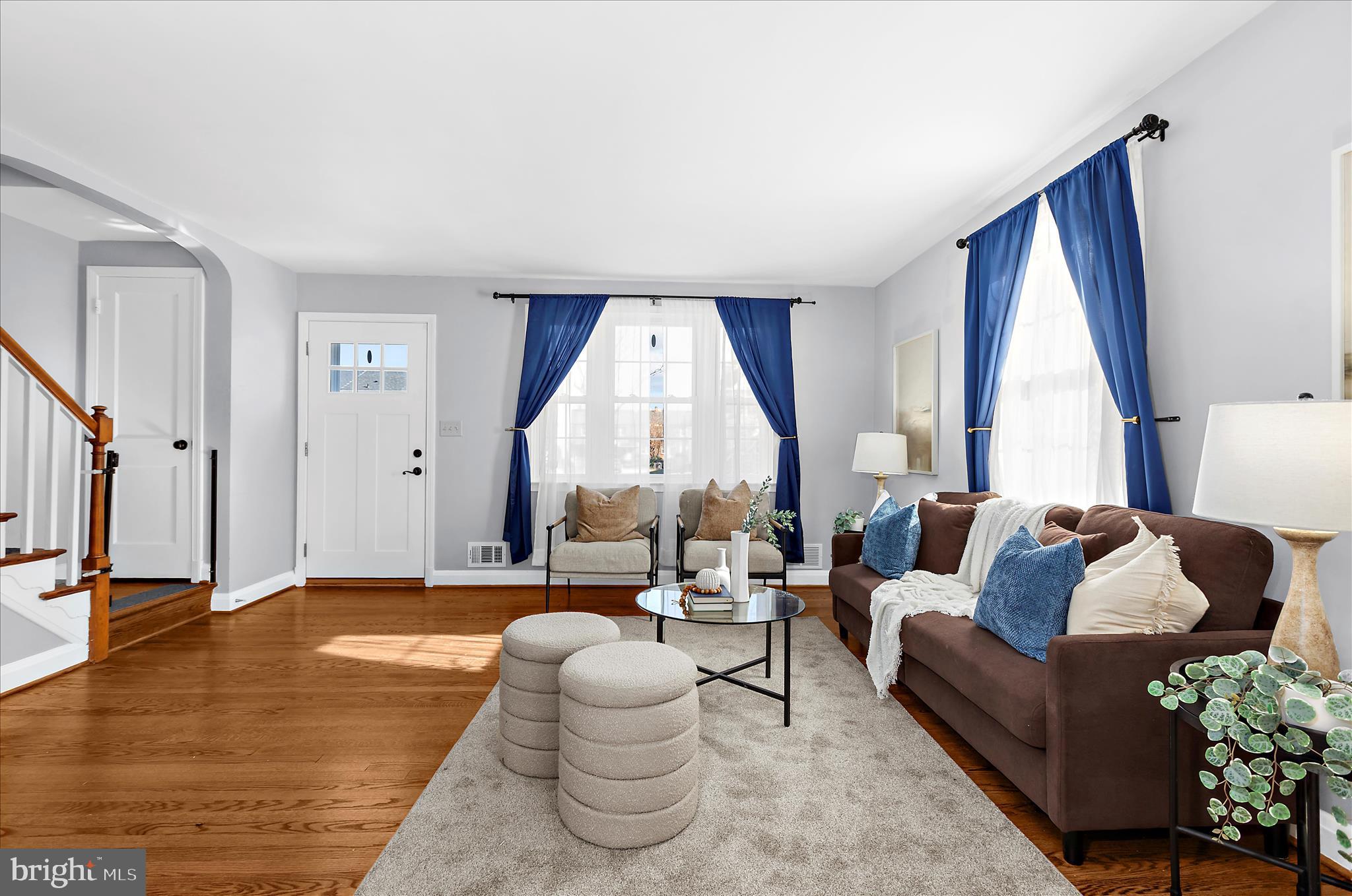 312 Small Court Catonsville, MD 21228 - Photo 7 of 41 a living room with furniture and a large window