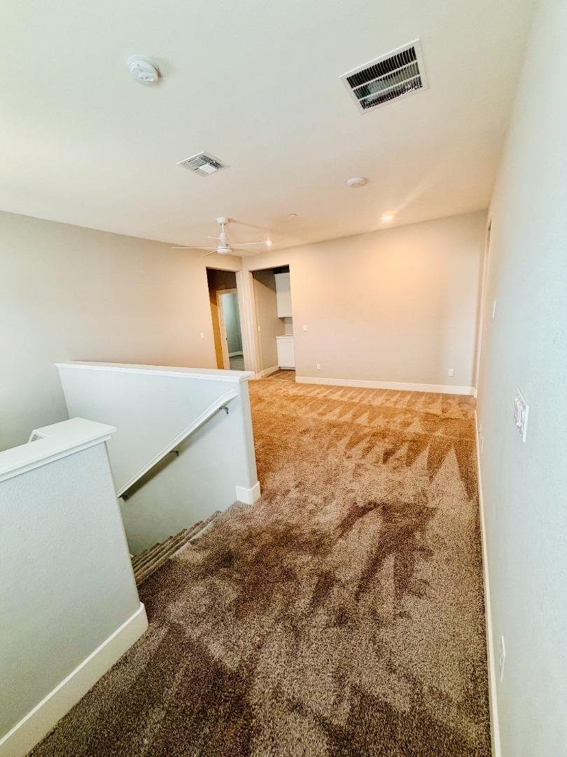 1946 Pollock Way Lodi, CA 95242 - Photo 22 of 35 a view of empty room with wooden floor