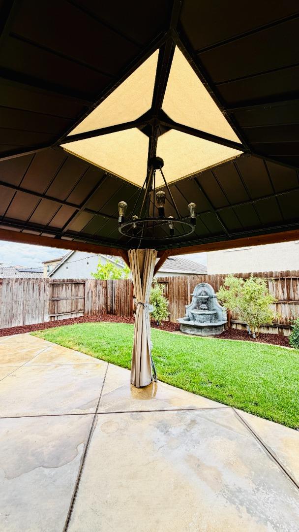 1946 Pollock Way Lodi, CA 95242 - Photo 35 of 35 a front view of a house with a yard and garage