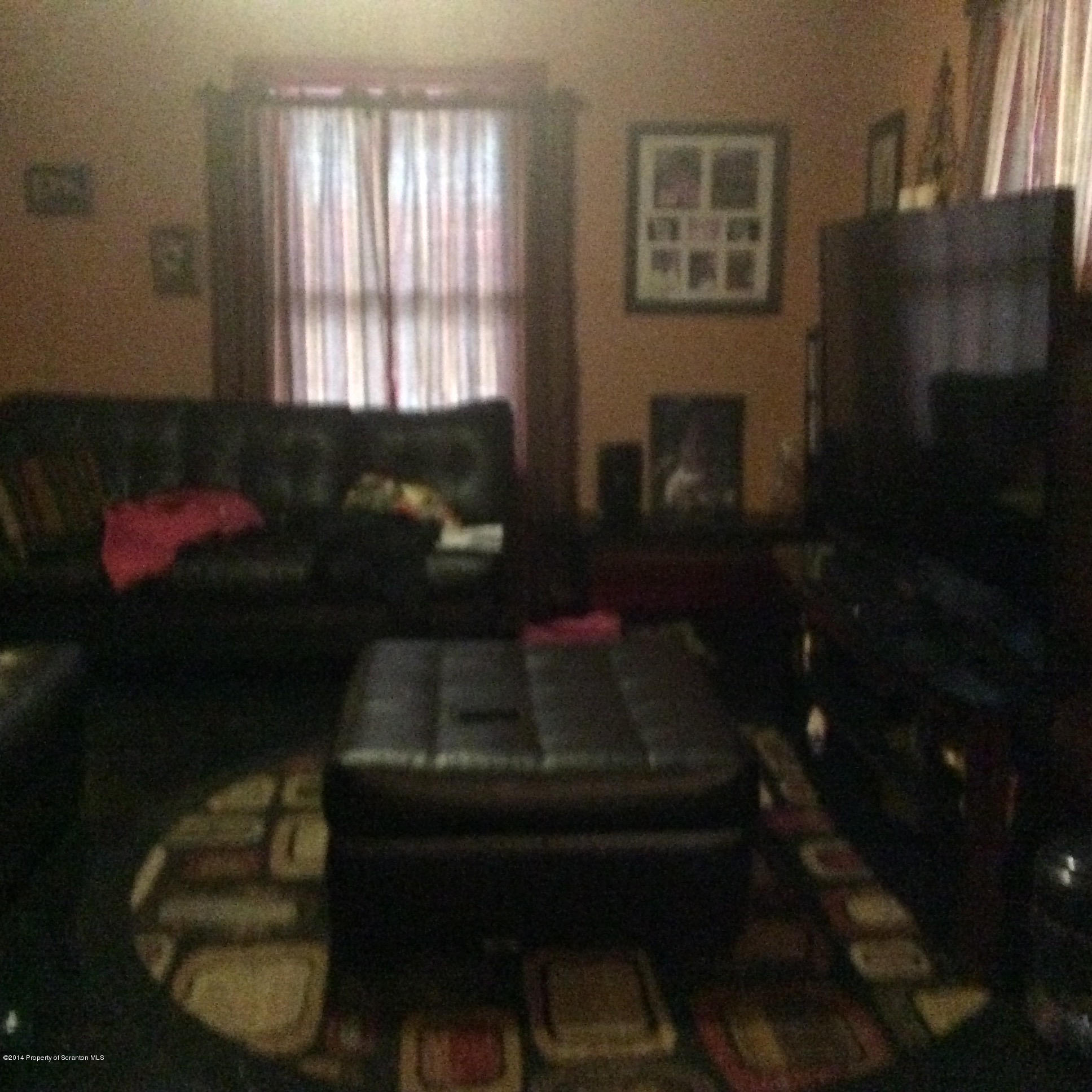612 Green Ridge Street Scranton, PA 18509 - Photo 4 of 23 a living room with furniture and a fireplace