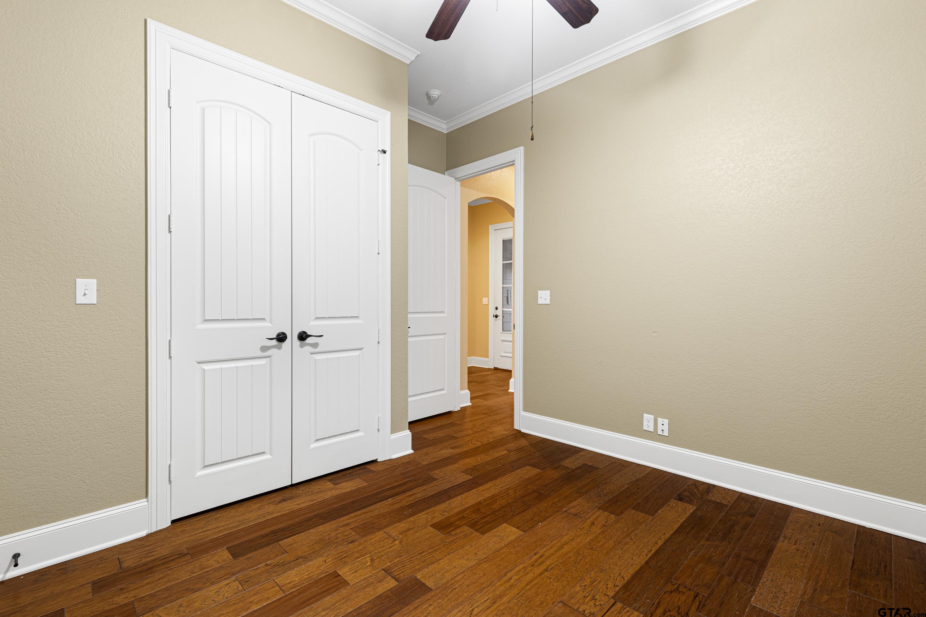3949 Hanover Place Tyler, TX 75701 - Photo 32 of 43 a view of an empty room with wooden floor
