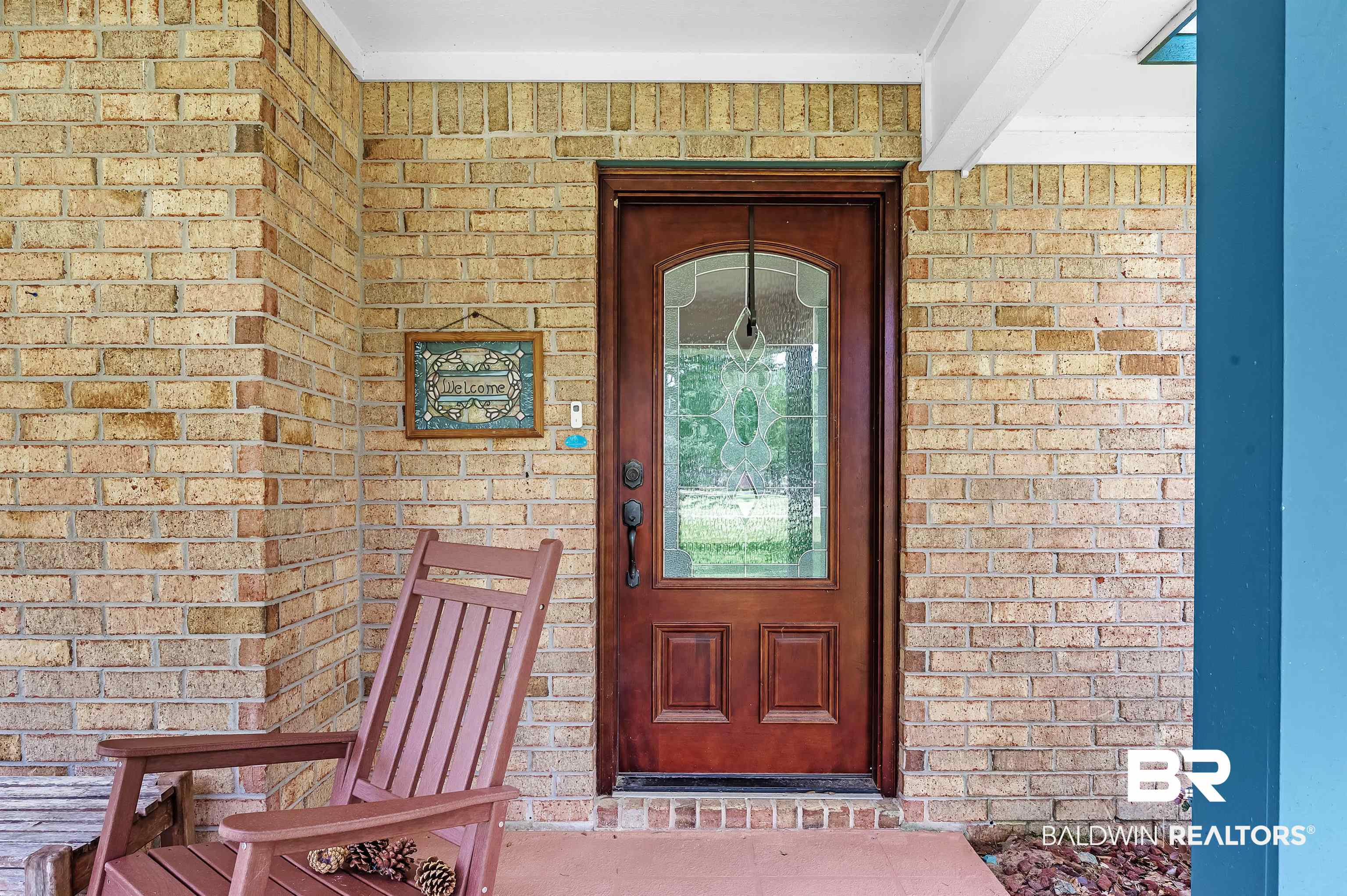 24551 Wolf Bay Drive Foley, AL 36535 - Photo 6 of 59 View of exterior entry with brick siding