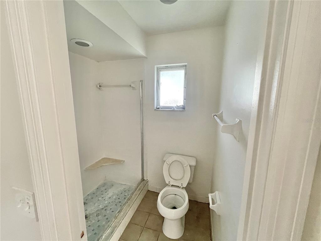 5912 Altec Road Orlando, FL 32808 - Photo 20 of 33 a bathroom with a sink and a toilet