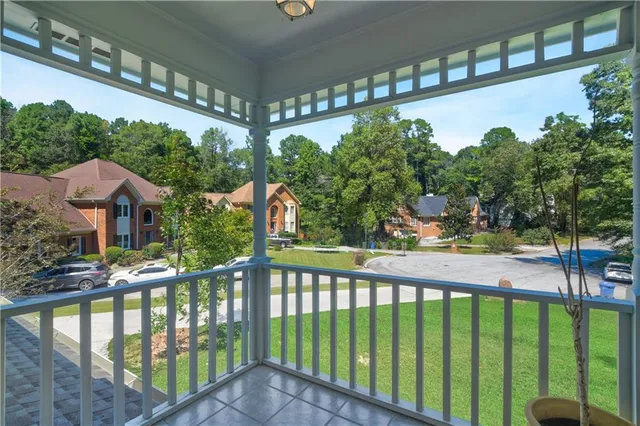 a view of a street from a balcony