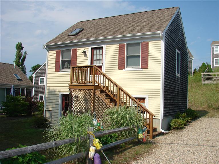 6 Shore Road, Unit 9 Truro, MA 02666 - Photo 11 of 19 a front view of a house with garden