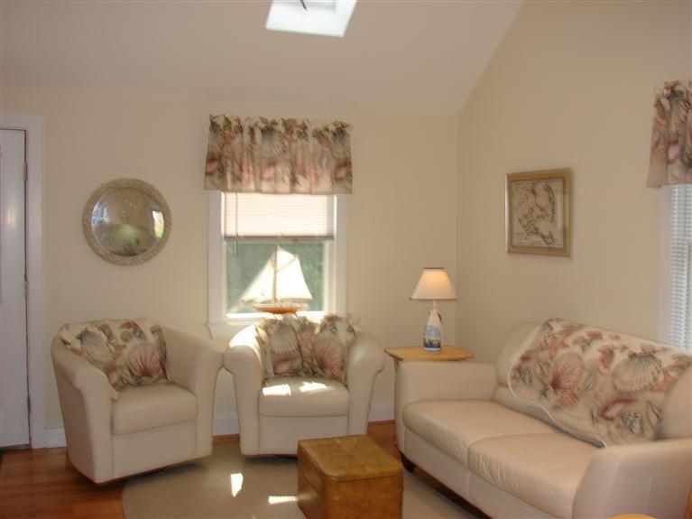 6 Shore Road, Unit 9 Truro, MA 02666 - Photo 4 of 19 a living room with furniture