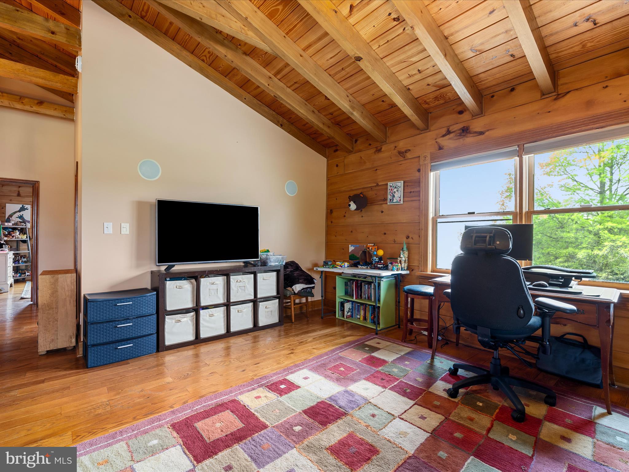 1124 Knupp Road Timberville, VA 22853 - Photo 54 of 93 a view of a livingroom with workspace and a window