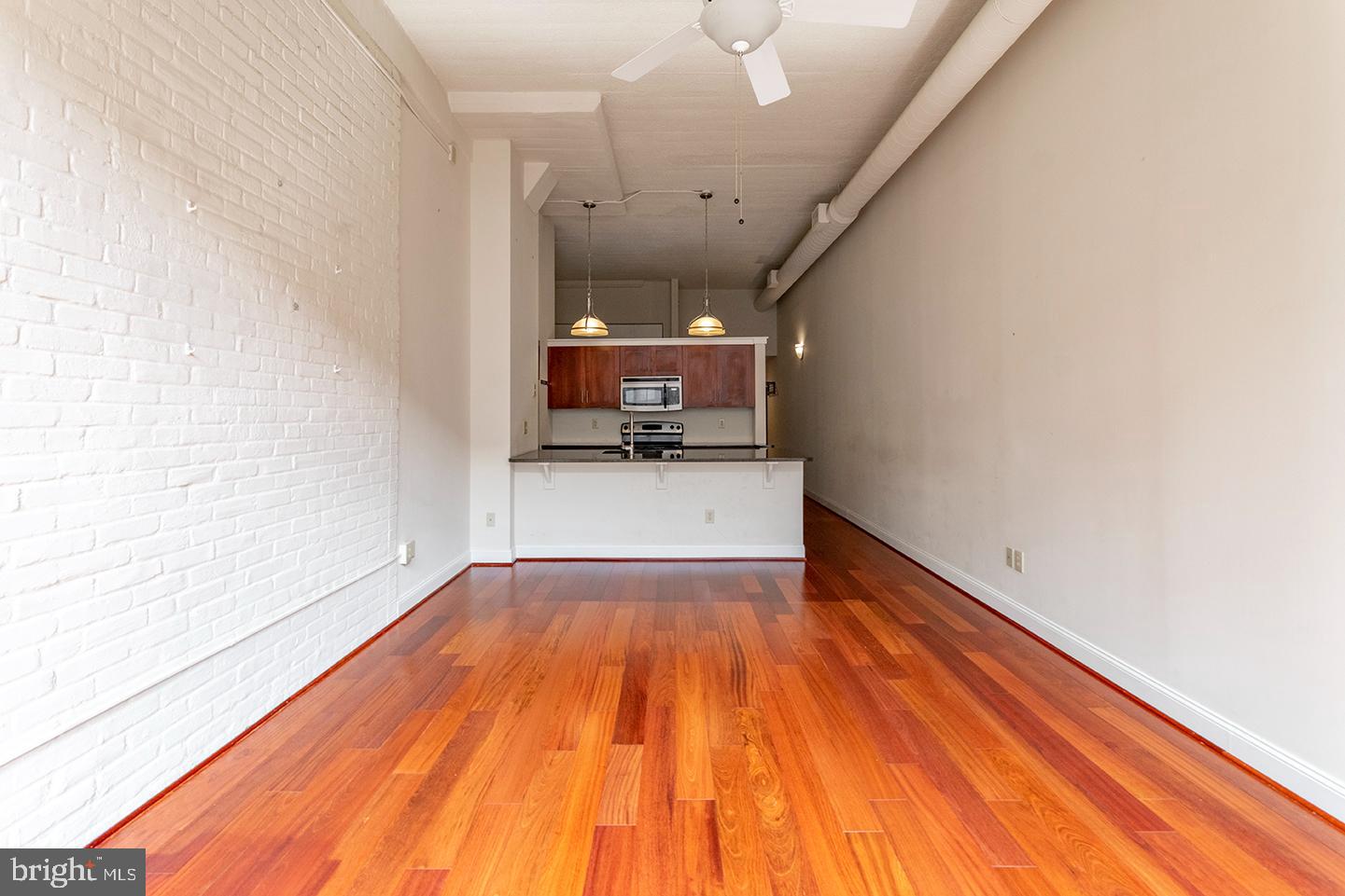 2429 Locust Street, Unit 513 Philadelphia, PA 19103 - Photo 3 of 11 a view of a livingroom with wooden floor