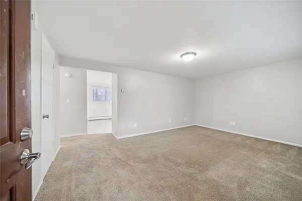 an empty room with windows
