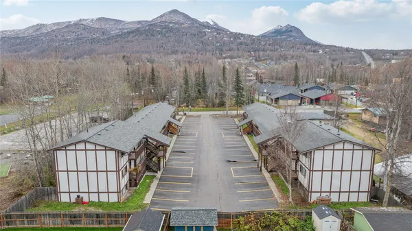 a view of a houses with a mountain