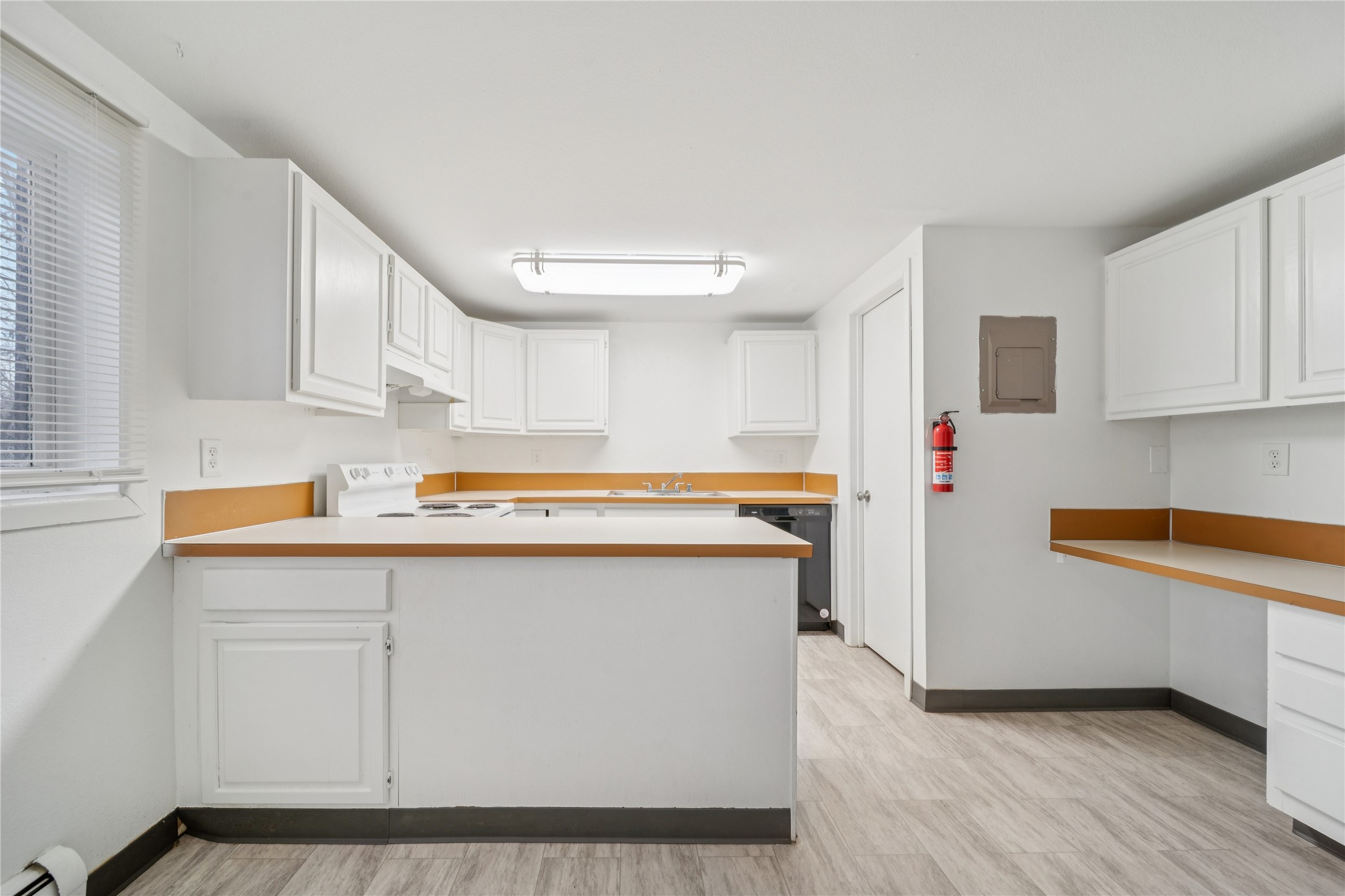 12332 End Street Other, AK 99577 - Photo 21 of 50 a kitchen with stainless steel appliances a sink a stove a refrigerator and cabinets