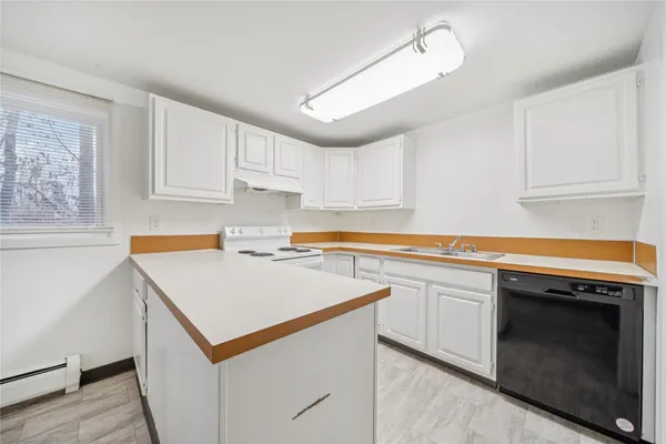 a storage room with washer and dryer