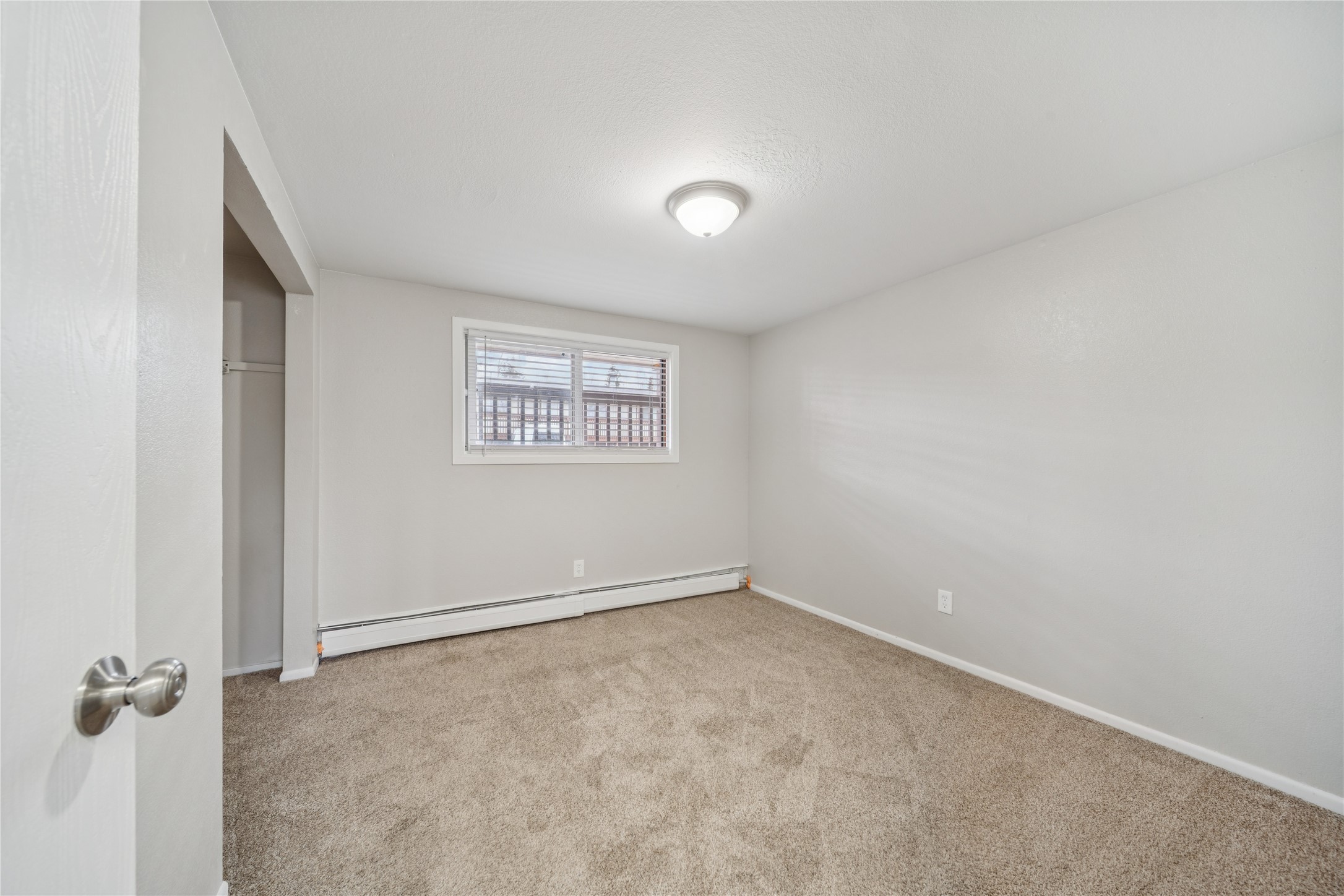 12332 End Street Other, AK 99577 - Photo 28 of 50 an empty room with a empty space and a window