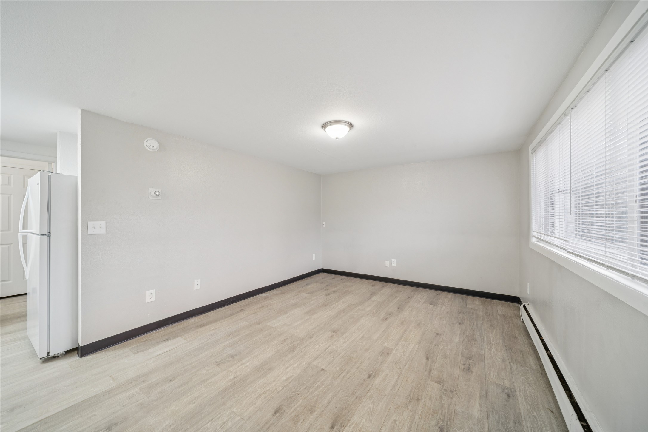 12332 End Street Other, AK 99577 - Photo 38 of 50 a view of a room with wooden floor and window