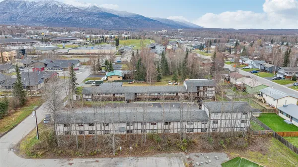 a car parked in front of a building