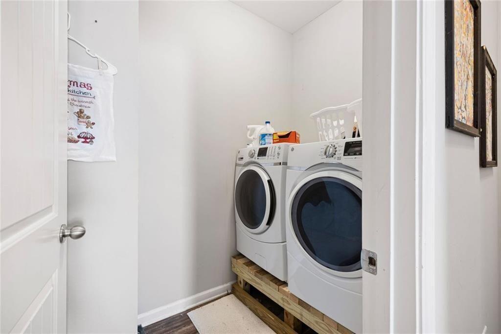 413 River Bluff Drive Temple, GA 30179 - Photo 16 of 30 a utility room with dryer and washer