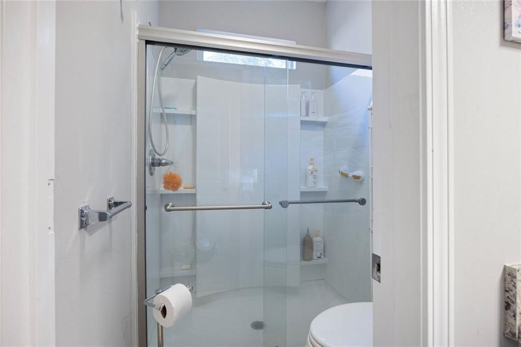 413 River Bluff Drive Temple, GA 30179 - Photo 20 of 30 a bathroom with a shower and toilet