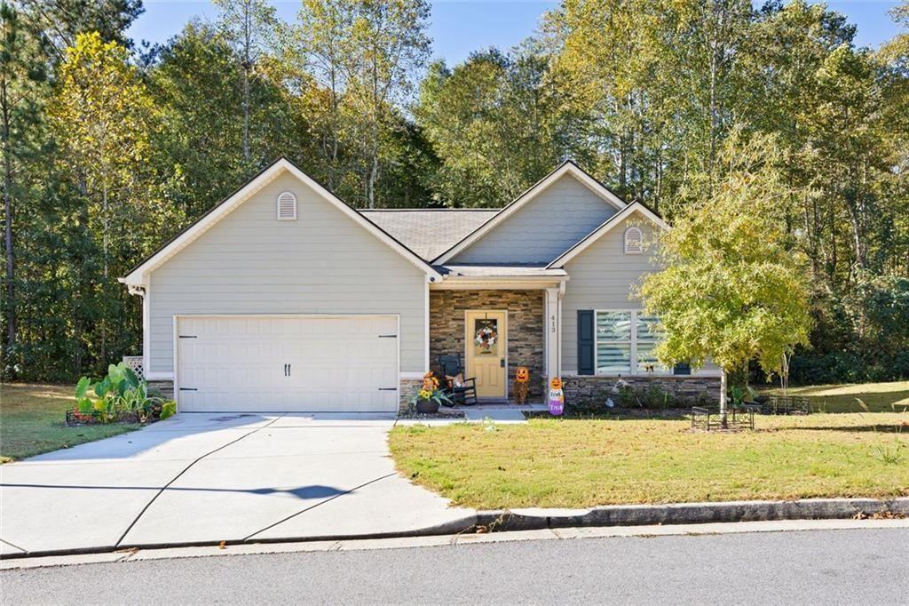 413 River Bluff Drive Temple, GA 30179 - Photo 2 of 30 a front view of house with garage and yard