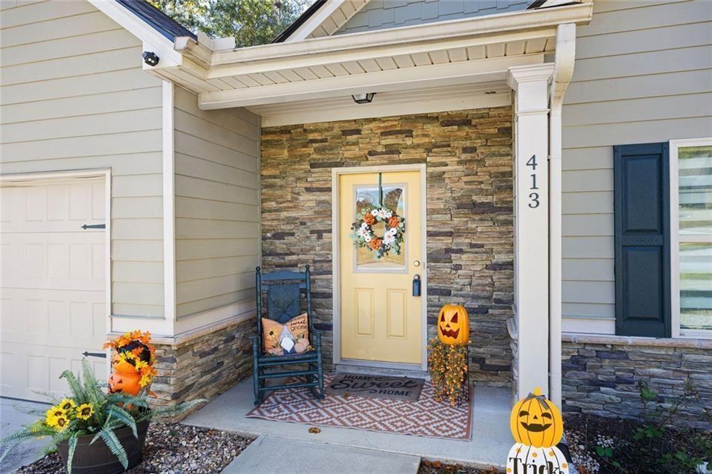 413 River Bluff Drive Temple, GA 30179 - Photo 4 of 30 a front view of a house with outdoor seating