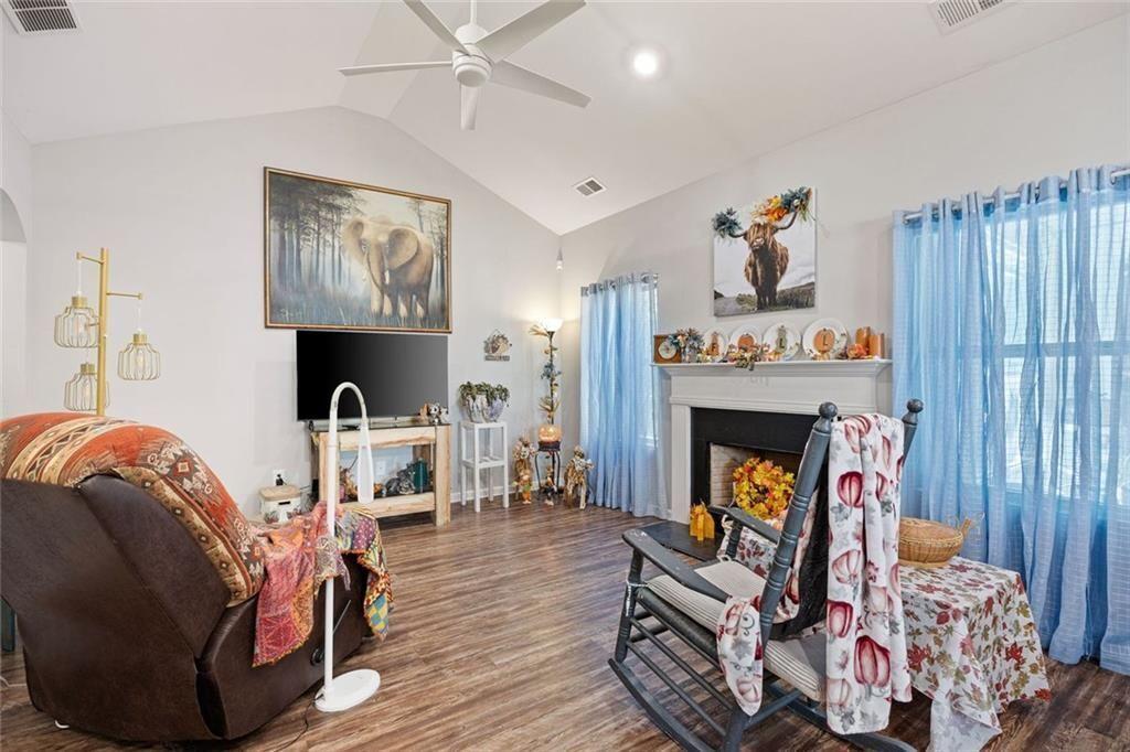 413 River Bluff Drive Temple, GA 30179 - Photo 7 of 30 a living room with furniture and a fireplace
