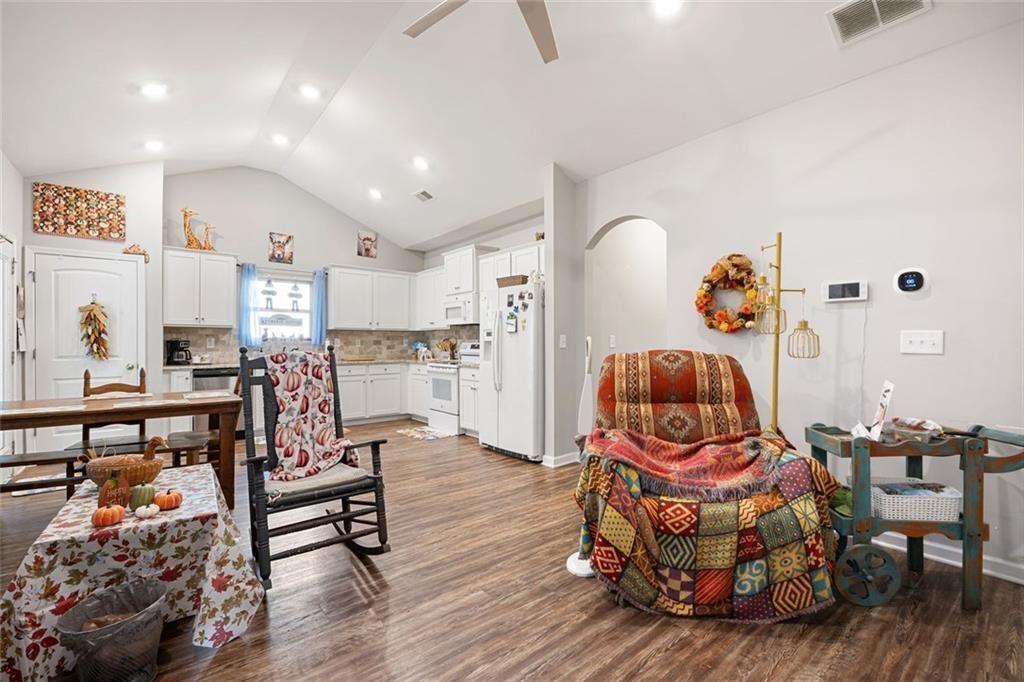 413 River Bluff Drive Temple, GA 30179 - Photo 9 of 30 a living room with furniture and a wooden floor