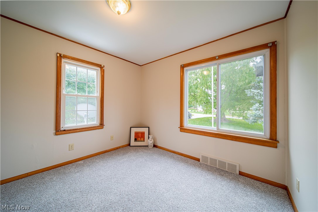 4639 Webb Road Perry, OH 44081 - Photo 12 of 34 1st of 2 main floor bedrooms that faces the front of the home.