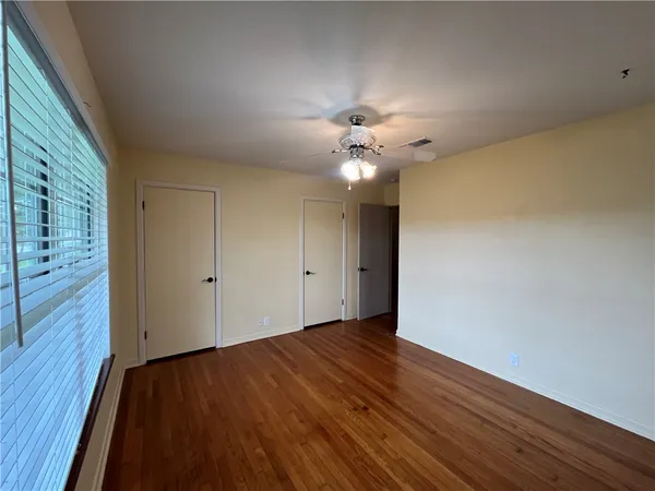 a bathroom with a sink vanity and a mirror