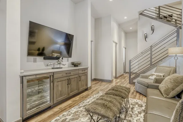 a bathroom with a sink vanity and mirror