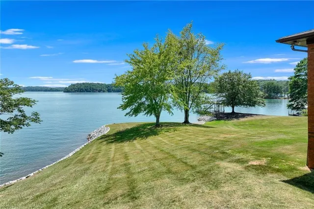 a view of swimming pool with a yard