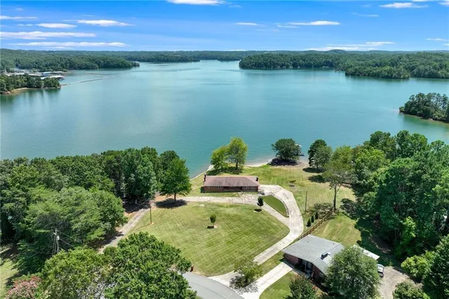 an aerial view of a houses with outdoor space