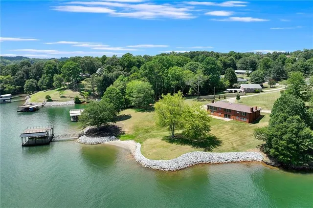 a view of a lake with a yard