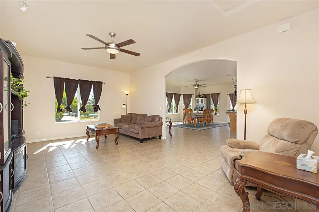 1400 Eucalyptus Drive El Cajon, CA 92021 - Photo 11 of 23 a living room with furniture and a window