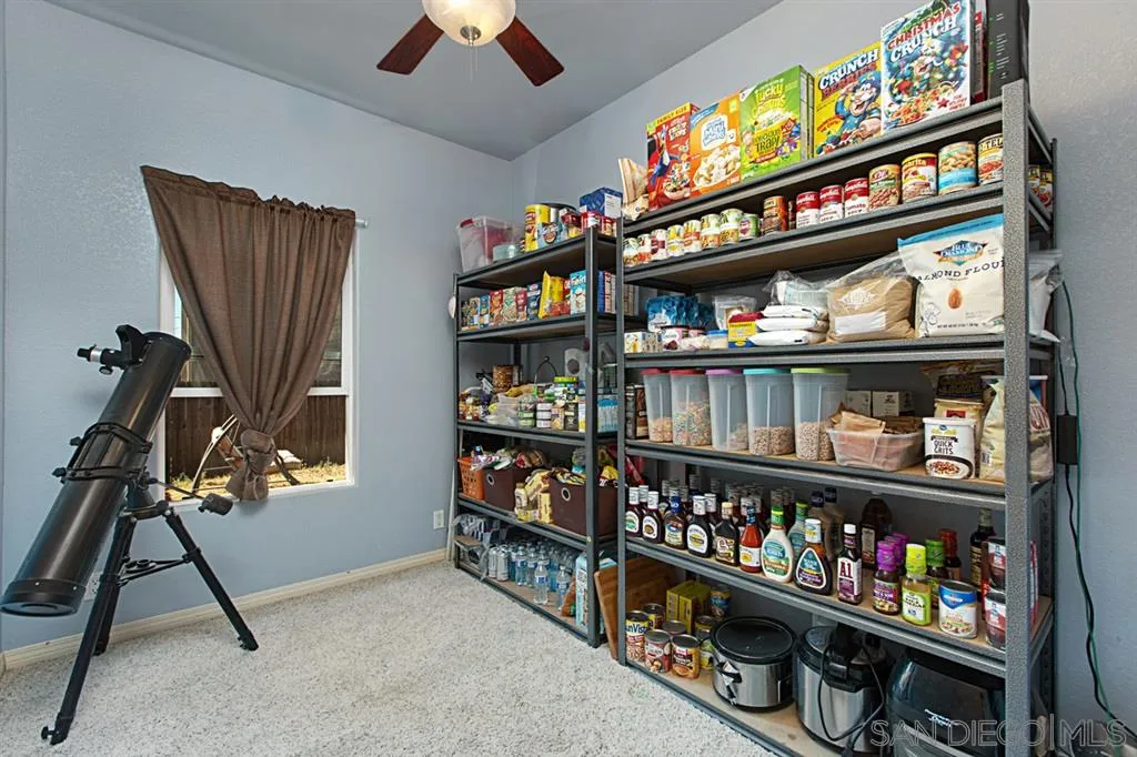 1400 Eucalyptus Drive El Cajon, CA 92021 - Photo 15 of 23 a store room with lots of books and a book shelf