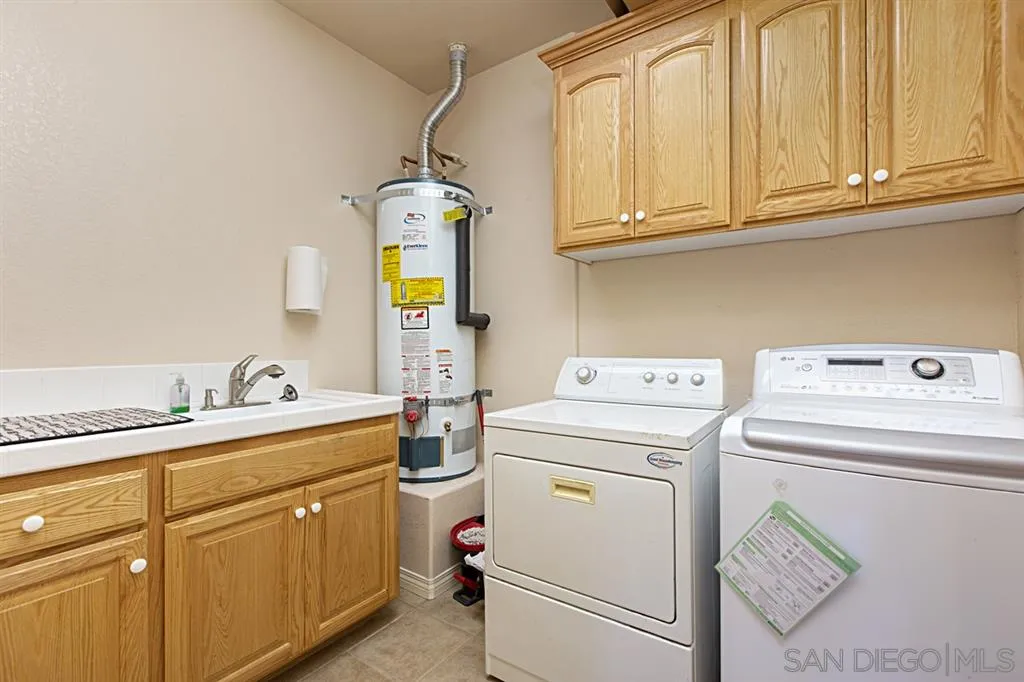 1400 Eucalyptus Drive El Cajon, CA 92021 - Photo 16 of 23 a utility room with dryer and washer