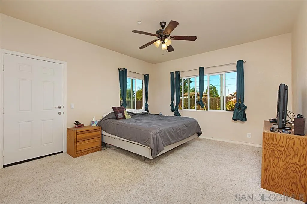 1400 Eucalyptus Drive El Cajon, CA 92021 - Photo 17 of 23 a living room with furniture and a large window