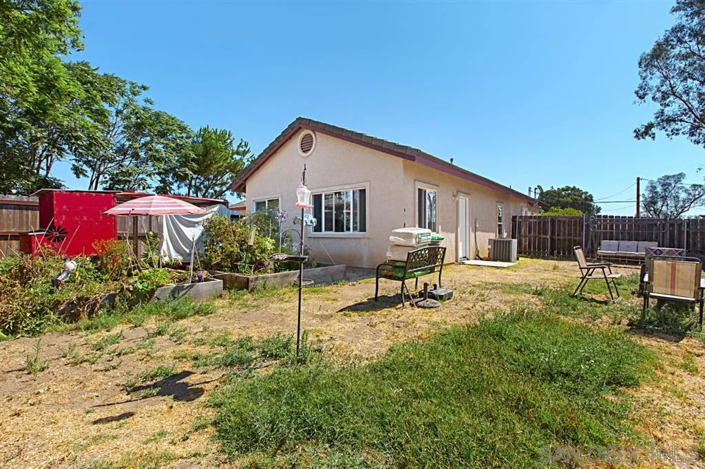 1400 Eucalyptus Drive El Cajon, CA 92021 - Photo 23 of 23 a backyard of a house with table and chairs