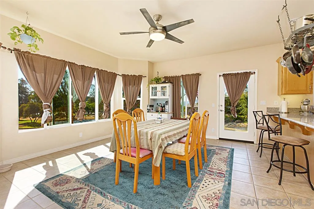 1400 Eucalyptus Drive El Cajon, CA 92021 - Photo 7 of 23 a view of a dining room with furniture window and outside view