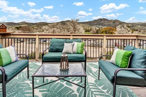 a view of a chairs in the roof deck