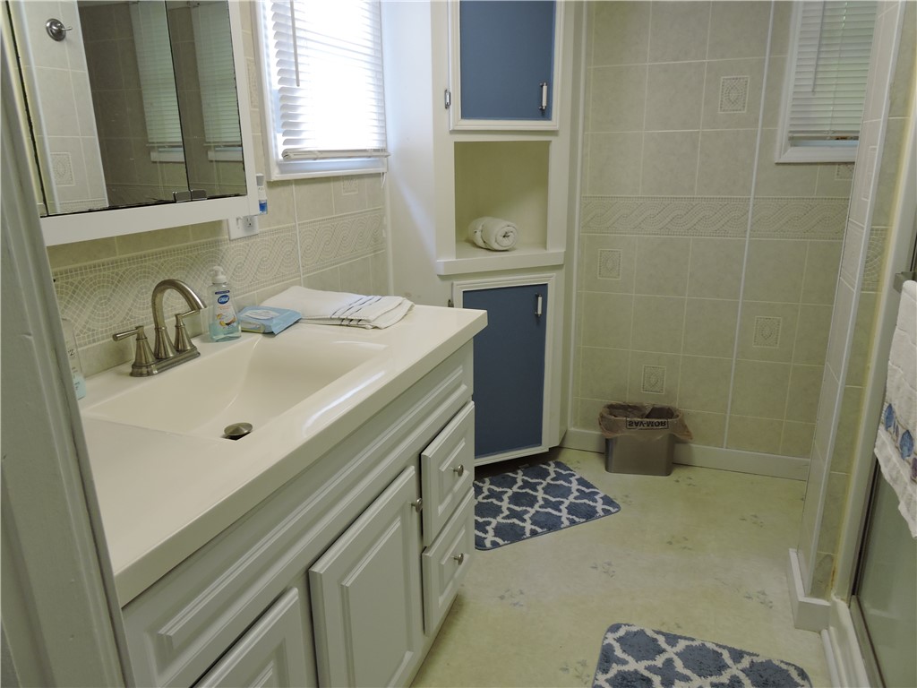 1901 Hattons Ford Road Townville, SC 29689 - Photo 16 of 33 A well-appointed bathroom vanity with integrated sink offers daily convenience.