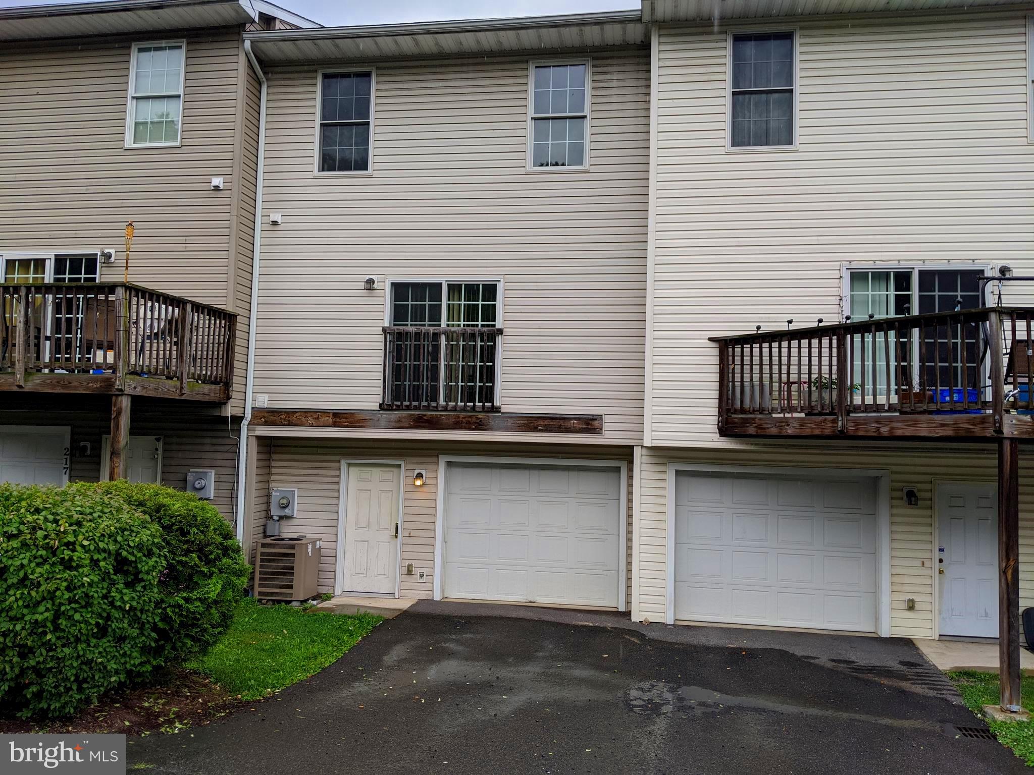 219 Decatur Street Cumberland, MD 21502 - Photo 1 of 8 Rear parking and 1 car garage.