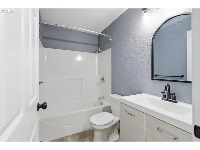 a house view with a garden space