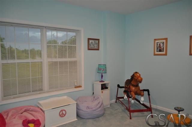 1983 East Bennington Road Owosso, MI 48867 - Photo 26 of 30 Lower level bedroom with another walk-in closet