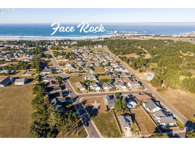 an aerial view of residential building with parking space