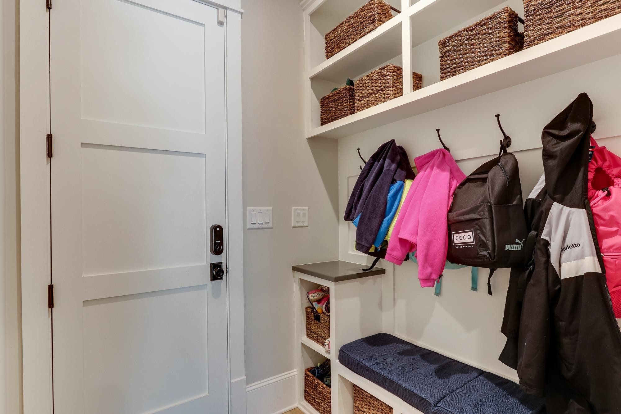 1302 Hedgelawn Way Raleigh, NC 27615 - Photo 23 of 38 This Area Will Help Make Your Daily Routine Easier. A Place For Coats, Shoes And Backpacks. Just Across The Hall From The Main Floor Laundry. Orgaization Made Easy In Mudroom Area
