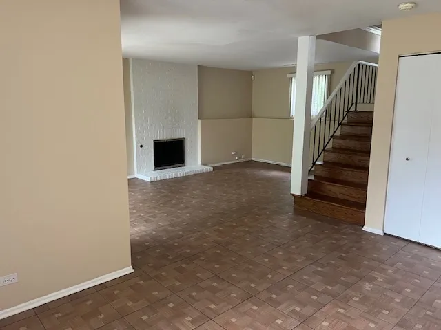 a view of a livingroom with a fireplace