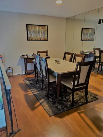 a view of a workspace with furniture