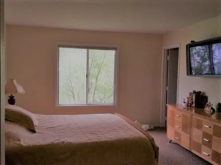 a view of a workspace with furniture