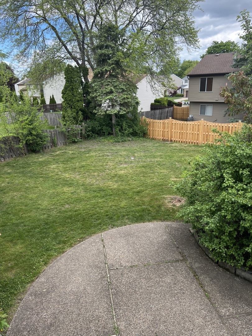 107 Horatio Boulevard Buffalo Grove, IL 60089 - Photo 27 of 27 a view of a house with a garden