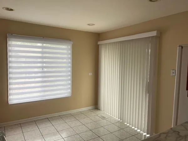a view of an empty room with window