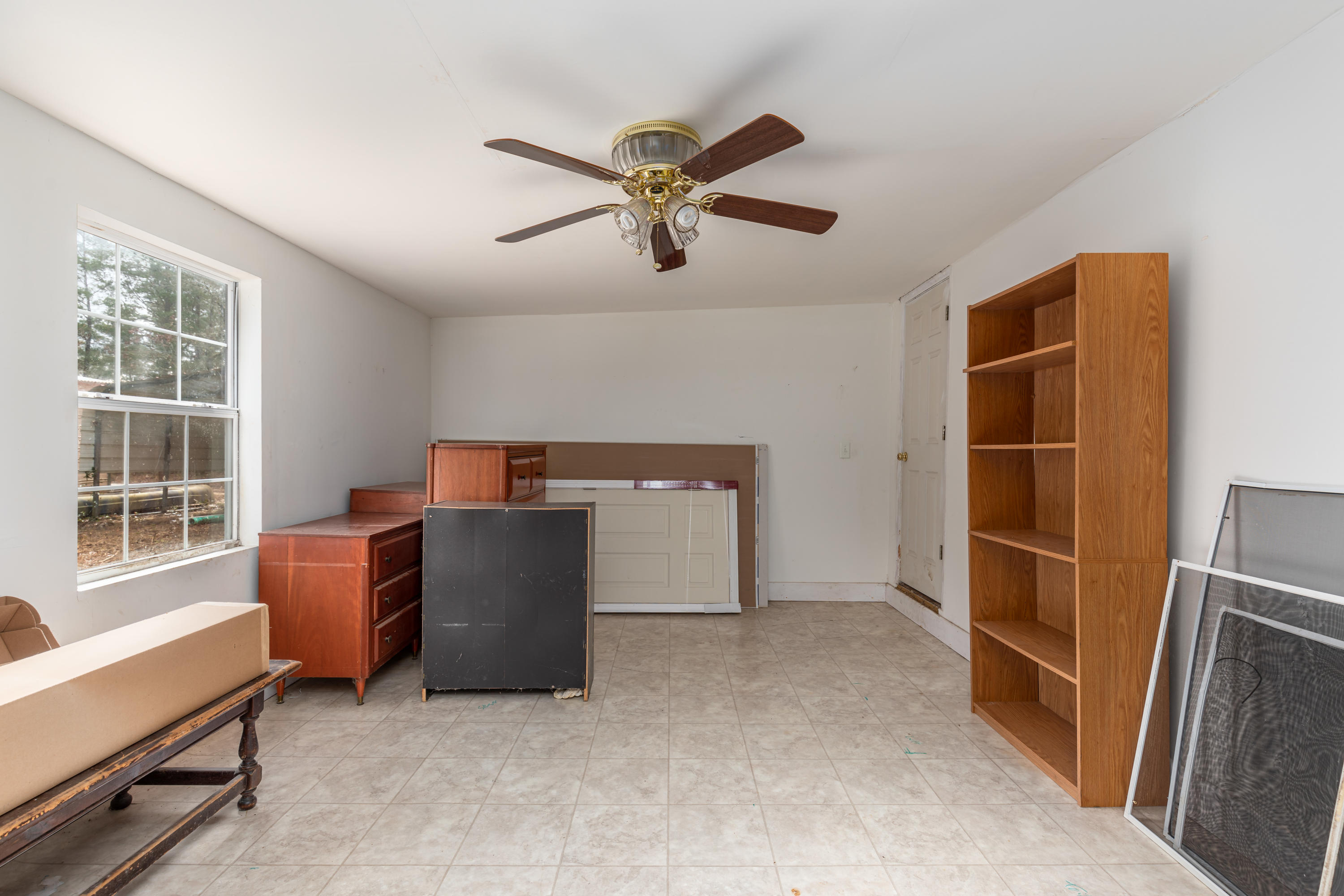 1504 Hinote Road DeFuniak Springs, FL 32433 - Photo 18 of 21 a room with furniture and windows